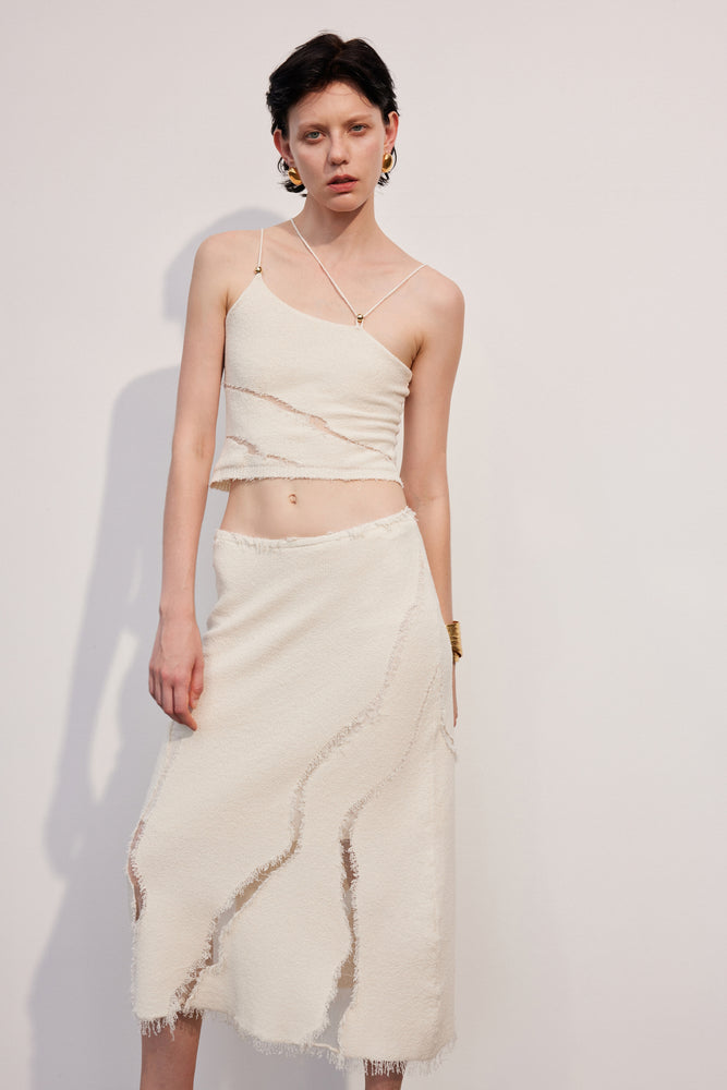 Irregular hollow knitted skirt