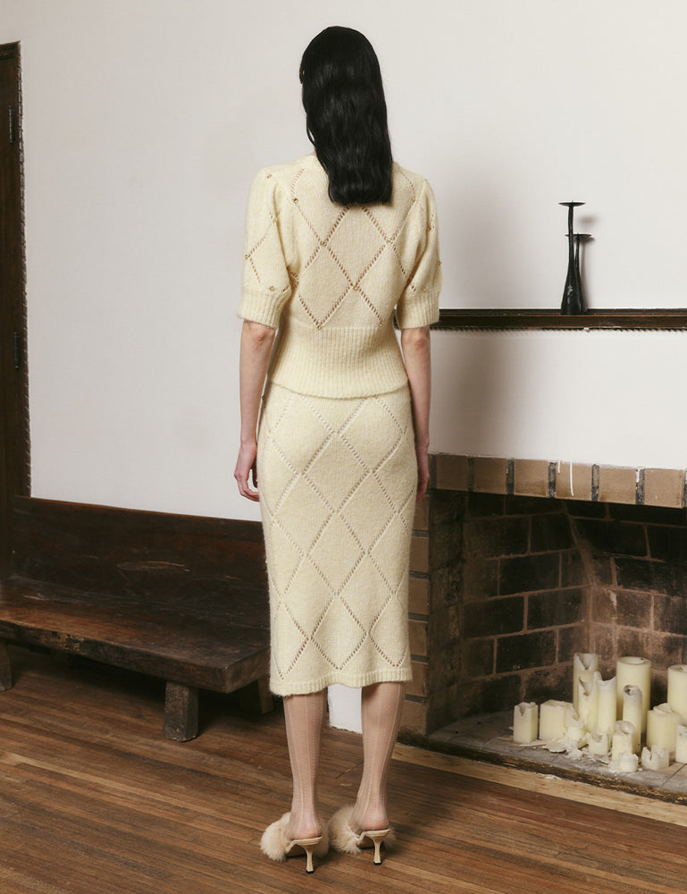 Goose yellow and off-white diamond hollow knitted skirt