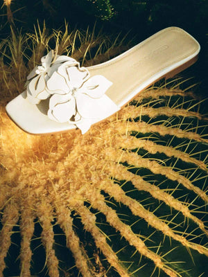 White 3D laser-cut flower sheepskin slippers