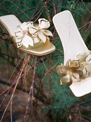 White 3D laser-cut flower sheepskin slippers