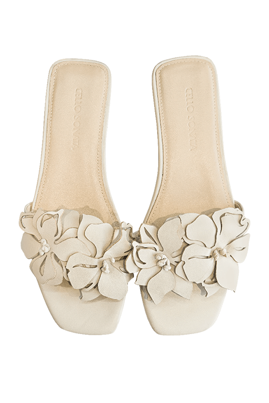 White 3D laser-cut flower sheepskin slippers