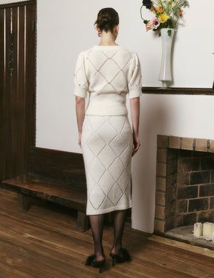 Goose yellow and off-white diamond hollow knitted skirt