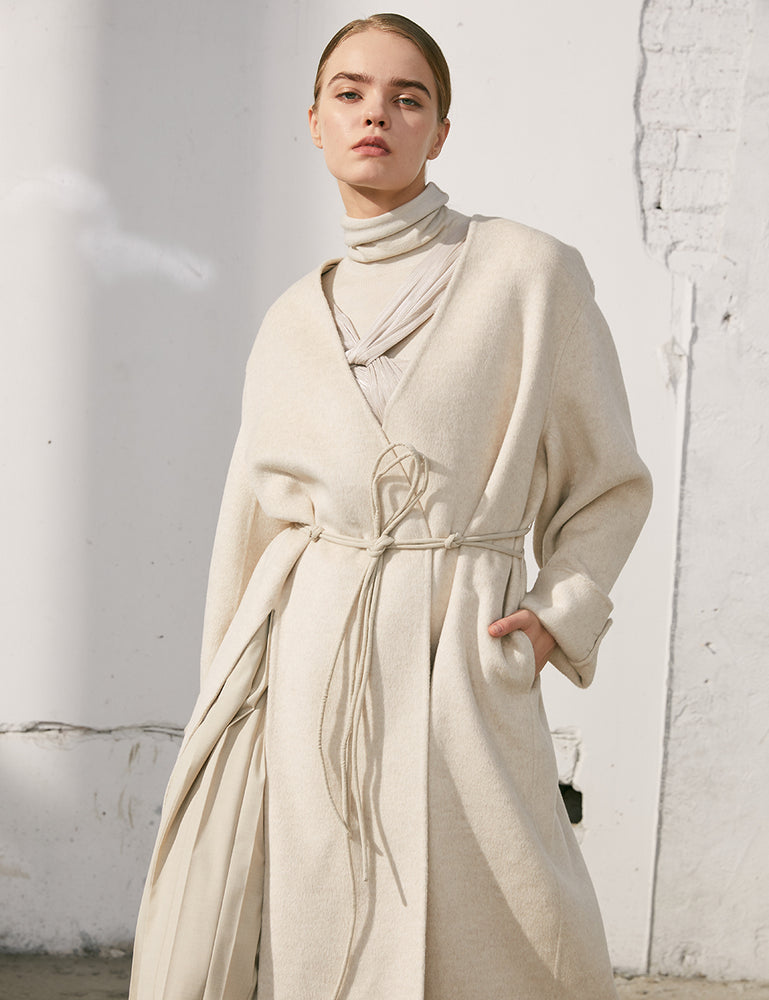 Collarless Wool Coat With Split And Pleats