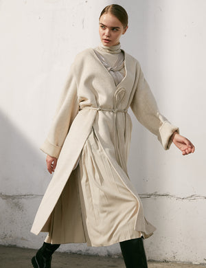 Collarless Wool Coat With Split And Pleats